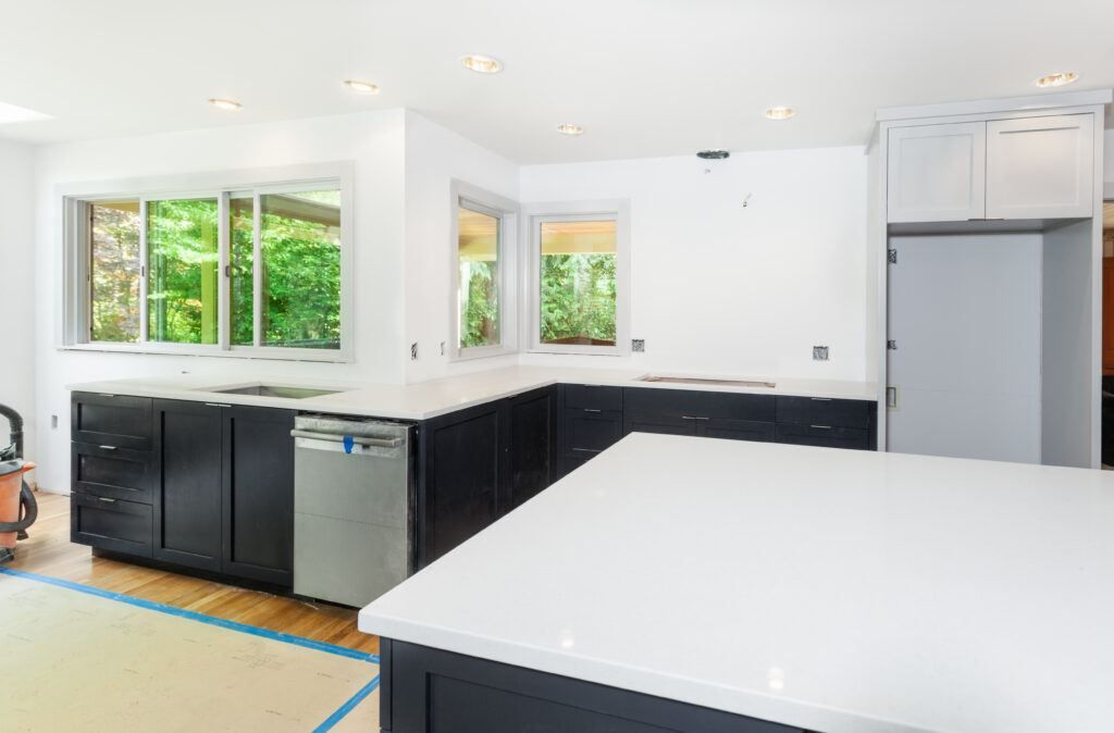 Custom kitchen cabinets installed. Engineered quartz countertop installed.