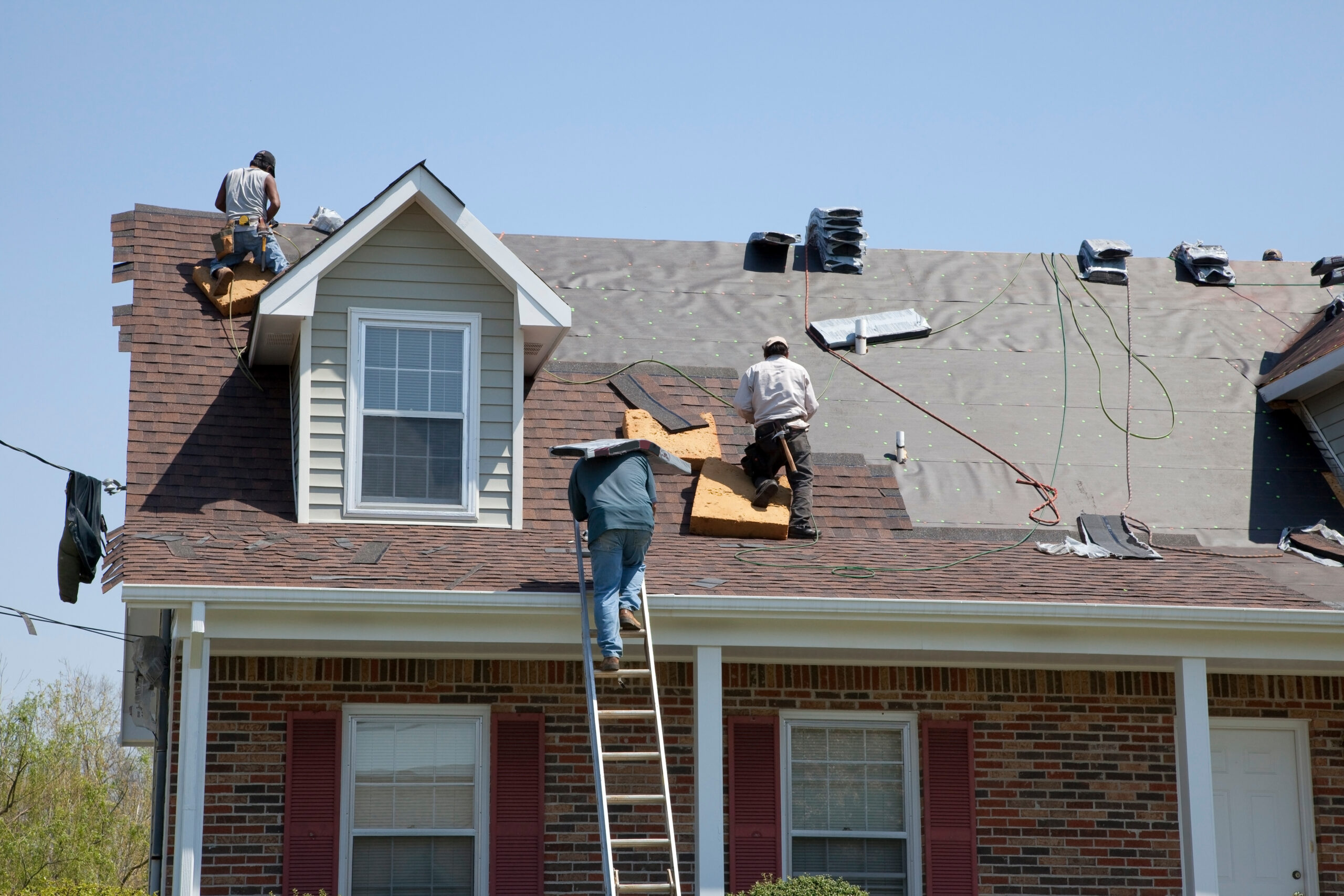 Roofers working