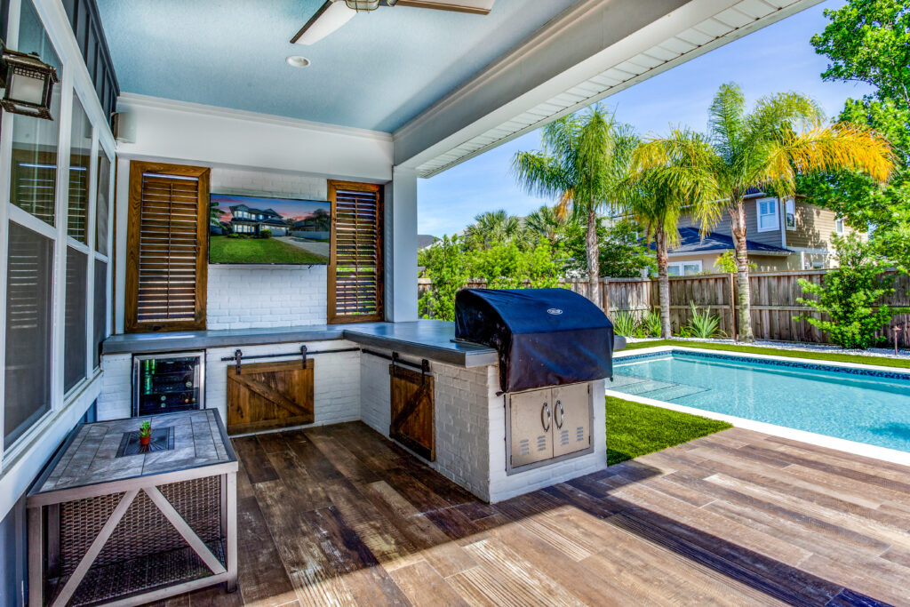 Backyard with pool and outdoor kitchen